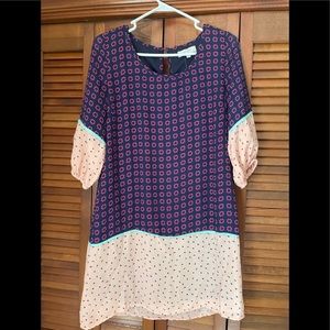 Umgee dress size small. Pinks and purple